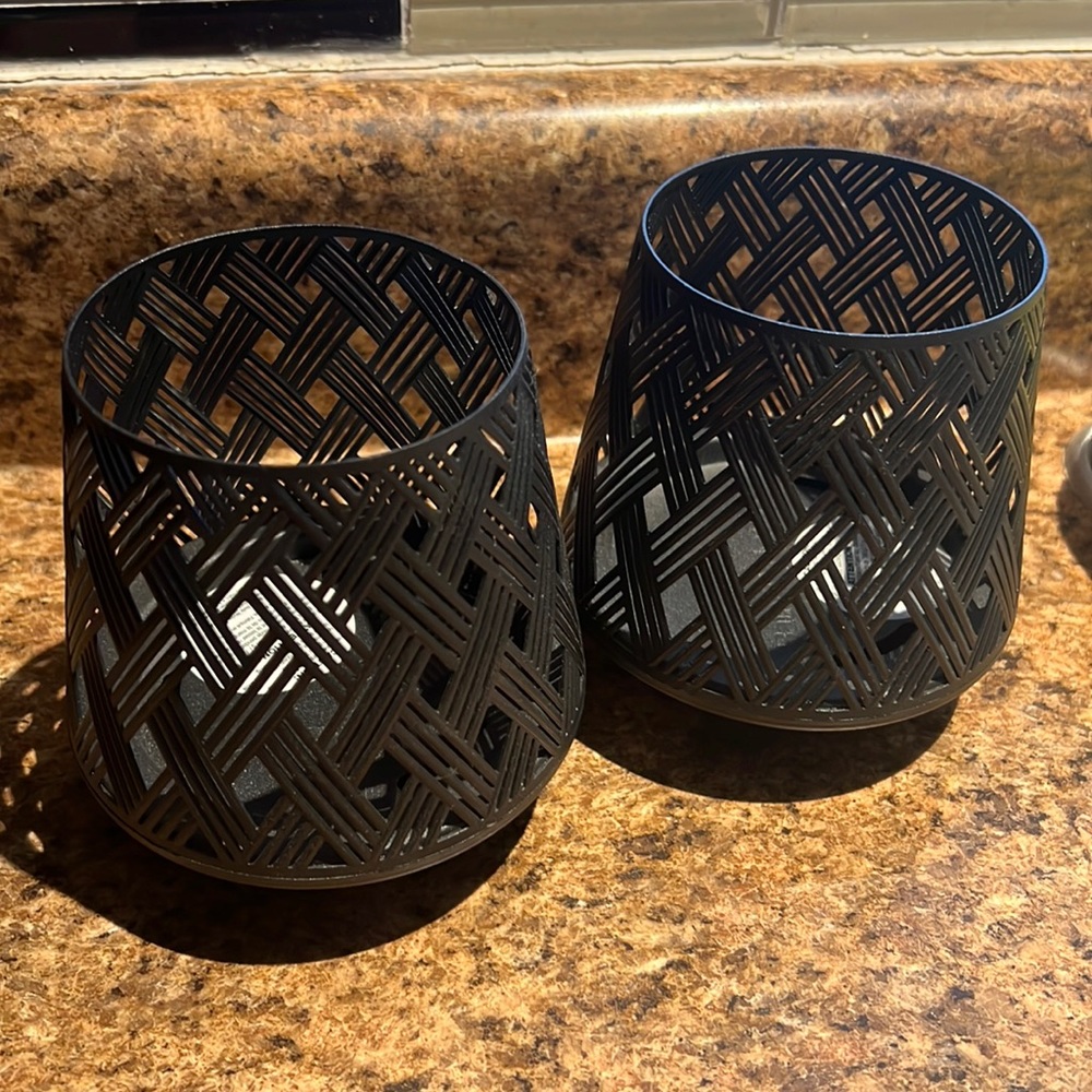 Two bath and body single wick candle holders